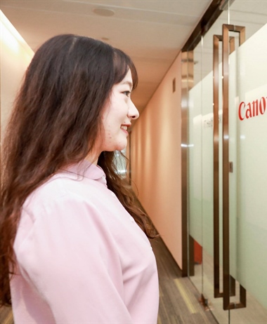 Canon using camera smile AI for work access